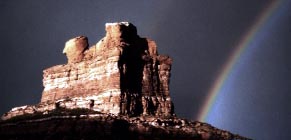 Photography from the Laramie Basin: Sand Creek Park pictures.  "Pot of Gold", presented by Grabo', Laramie, Wyoming's "one-man chamber of commerce."  This magnificent sandstone monolith (Chimney rock, also known as Camel rock,) sits astride the Wyoming / Colorado state line like a gargantuan survey marker.  Click the picture for more info and a close-up!