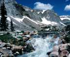 Wyoming Photography by Grabo / Wyoming mountain photography; "Lake Marie - Falls."   Wyoming art designed to make you want to dip your feet in the rushing water.  Wyoming picture depicts the rapids,  Lake Marie, and the Snowy Range in the  Medicine Bow National Forest.